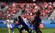 Samuel Gidi #11 of FC Cincinnati heads the ball under pressure from Toronto FC players dur...