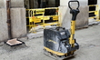 Construction equipment is seen in front of a restaurant and redevelopment work takes place...