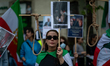 Iranian residents hold a demonstration outside the United States Embassy in Madrid, Spain,...