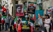 Iranian residents hold a demonstration outside the United States Embassy in Madrid, Spain,...