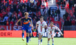 FC Cincinnati forward Tom Barlow #16 heads the ball away from Toronto FC players during a...