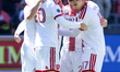 Toronto FC striker Josh Sargent (center) and Toronto FC players celebrate a team goal duri...
