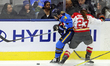 Renata Fast (#14), left, is checked by Sarah Wozniewicz (#23) during a Professional Women'...