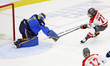 Goaltender Raygan Kirk (#67) makes a save on Fanuza Kadirova (#71) during a Professional W...