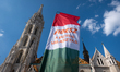 A campaign flag in the colors of the Hungarian national flag with the Fidesz slogan ''A bi...