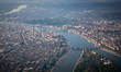 An aerial view from a landing passenger plane shows central Budapest with the Danube River...