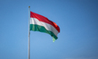 The national flag of Hungary flies on a flagpole outside the passenger terminal of Budapes...