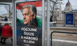A campaign poster featuring Hungarian Prime Minister Viktor Orban is displayed at a public...