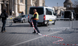 A security guard blocks access to part of Szentharomsag ter near Matthias Church (Matyas-t...