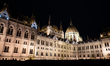 A fragment of the Hungarian Parliament building (Orszaghaz) is seen from a nearby square i...