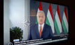 A television set in a hotel room shows Hungarian Prime Minister Viktor Orban during a tele...