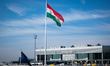 The national flag of Hungary flies on a flagpole outside the passenger terminal of Budapes...