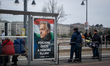 A campaign poster featuring Hungarian Prime Minister Viktor Orban and the Hungarian-langua...
