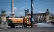 A municipal street-cleaning vehicle washes part of Heroes' Square (Hosok tere) after the p...