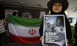 Members of the Iranian community and various social organizations gather at the Embassy of...