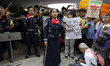 A mariachi band accompanies members of the Iranian community and various social organizati...