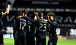 Daniel Braganca of Sporting CP celebrates with a teammate after scoring the team's first g...