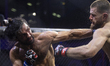 Serbian fighter Nemanja Todorovic (right) competes against German fighter Mert Ozyildirim...