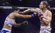 Serbian fighter Marina Spasic (right) competes against Brazilian fighter Samara Santos (le...