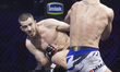 Slovenian fighter Domen Drnovsek (right) competes against Russian fighter Alexey Timoshenk...
