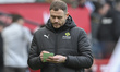 Fourth Official Leigh Doughty makes notes during the Sky Bet Championship match between Mi...