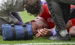 Dael Fry of Middlesbrough receives treatment after a clash of heads during the Sky Bet Cha...