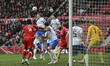 Colby Bishop of Portsmouth heads away from a corner during the Sky Bet Championship match...