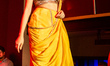 Actress Falaque Rashid Roy walks the ramp as a showstopper during ''Midnight Hot - Poila B...