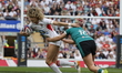Ellie Kildunne of England is tackled by Dannah O'Brien of Ireland during the Guinness Wome...