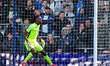 Wrexham AFC goalkeeper Arthur Okonkwo watches the ball during the Sky Bet Championship mat...