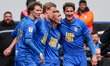 Christoph Klarer of Birmingham City (second from left) celebrates with teammates after sco...