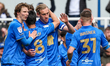 Christoph Klarer of Birmingham City (center) celebrates and is congratulated for a goal du...