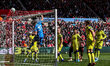 Tottenham Hotspur goalkeeper Antonin Kinsky tips the ball over the crossbar during the Pre...