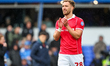 Sam Smith of Wrexham AFC thanks the fans for their support at full-time during the Sky Bet...