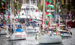 Dozens of vessels depart from the port of Barcelona as part of an international flotilla b...