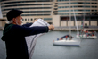 Dozens of vessels depart from the port of Barcelona as part of an international flotilla b...