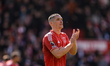 Nikola Milenkovic of Nottingham Forest applauds the fans after the final whistle during th...
