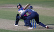 Eleanor Threlkeld of Lancashire catches Durham's Emily Windsor down the leg side during th...