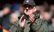 A Nottingham Forest fan applauds during the Premier League match between Nottingham Forest...