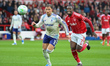 Callum Hudson-Odoi of Nottingham Forest puts pressure on Matty Cash of Aston Villa during...