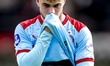 SC Feyenoord Rotterdam player Aymen Sliti appears disappointed after the draw during the D...