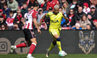 Richarlison of Tottenham Hotspur runs at Granit Xhaka of Sunderland during the Premier Lea...