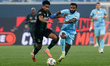 Wendel (R) of Zenit and Kevin Lenini Pina of Krasnodar vie for the ball during the Russian...
