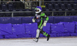 Andrej Divis, 8, of Czechia runs back to the pits for a second bike after his machine stal...