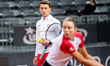 Dawid Celt, coach and captain of the Polish national team, and Magda Linette are seen duri...