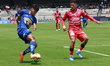 Robert Morales #31 of Pumas and Mauro Zaleta #14 of Mazatlan compete for the ball during t...
