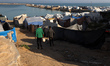 A general view of tents of displaced Palestinians inside Gaza City's port on April 13, 202...