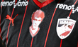 Mircea Lucescu's face is printed on Dinamo's shirt during the Superliga Play Off match bet...