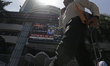 A man walks past the Bombay Stock Exchange (BSE) building in Mumbai, India, on April 13, 2...