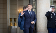 French President Emmanuel Macron is seen at the entrance of the Elysee Presidential Palace...